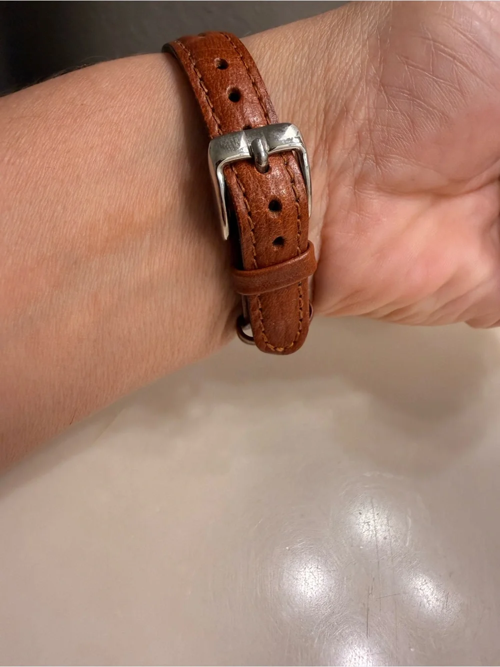 Brown Leather-Strap Watch with Gold-Bezel Accent need battery